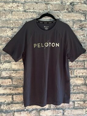Peloton Dark Blue/Charcoal Logo Tee in excellent condition. Ribbed material feel